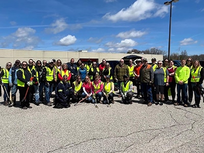 Dow volunteers pose for a group before a community event