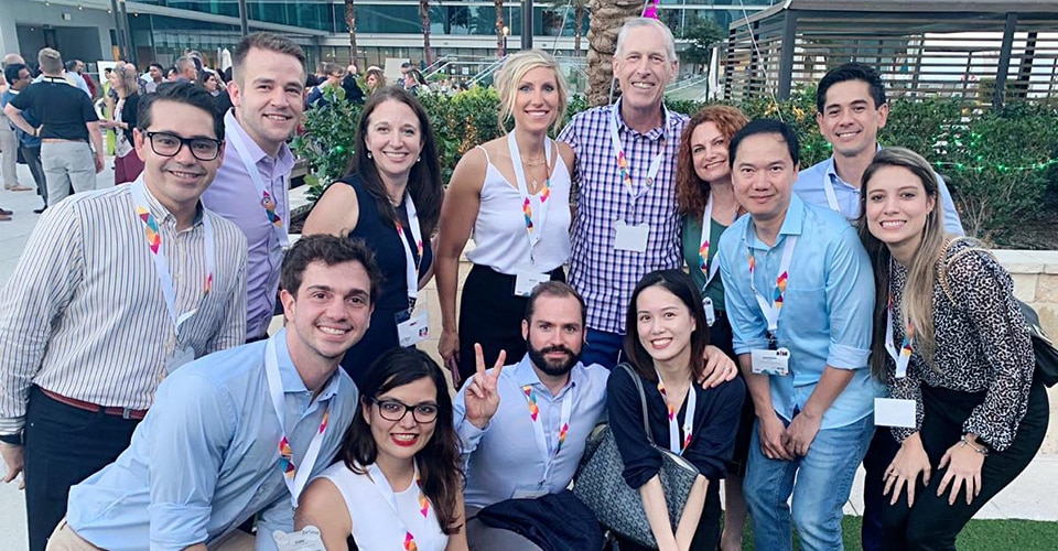 Jim Fitterling and a group of employees at an event